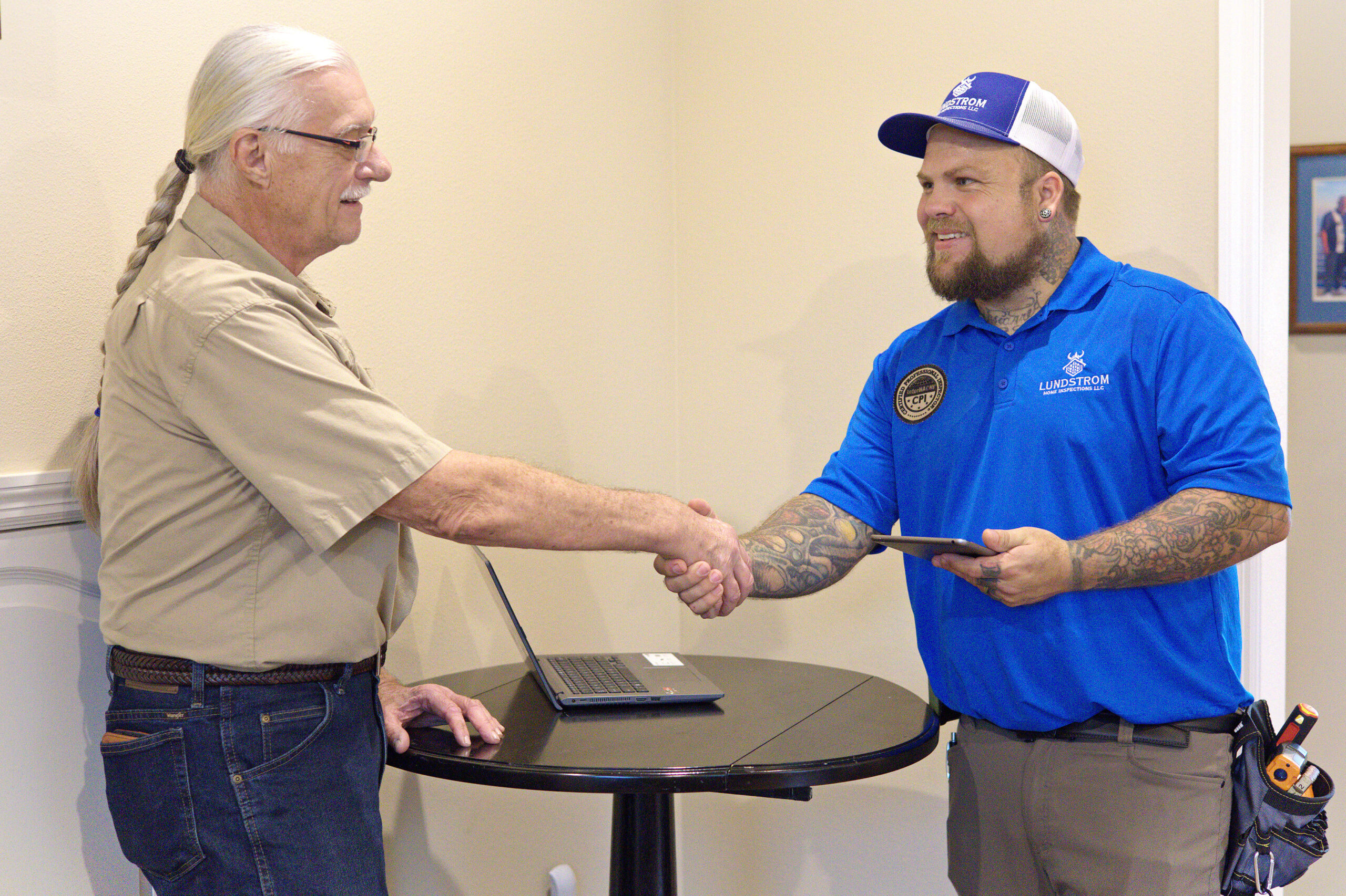 Investment property inspection completed by Lundstrom Home Inspections with inspection report handoff to client