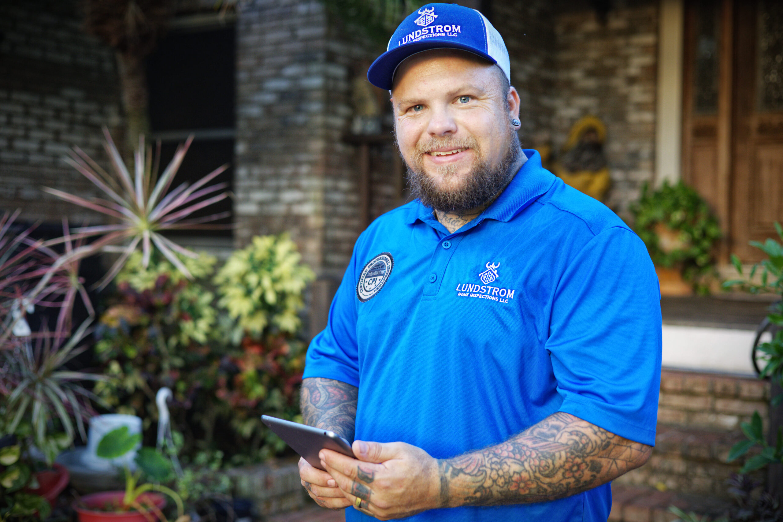 Sewer scope inspection by Lundstrom Home Inspections, showing a certified inspector documenting findings during a residential sewer line evaluation.