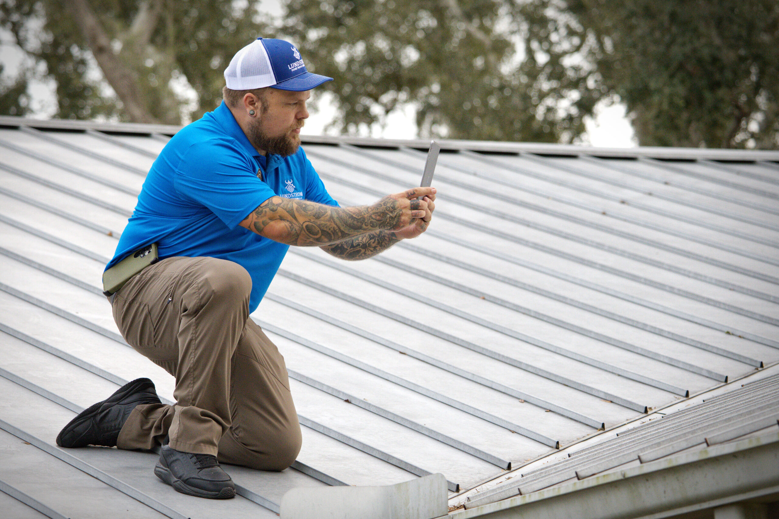 Roof certification inspection by Lundstrom Home Inspections documenting metal roof condition for certification purposes